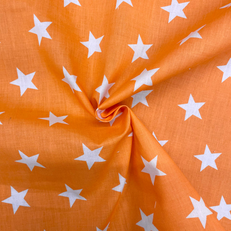Stars Orange Polycotton Fabric | Width - 115cm/45inch - Shop Fabrics, Cushions & Dressmaking Supplies online - Fabric Family