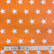 Stars Orange Polycotton Fabric | Width - 115cm/45inch - Shop Fabrics, Cushions & Dressmaking Supplies online - Fabric Family